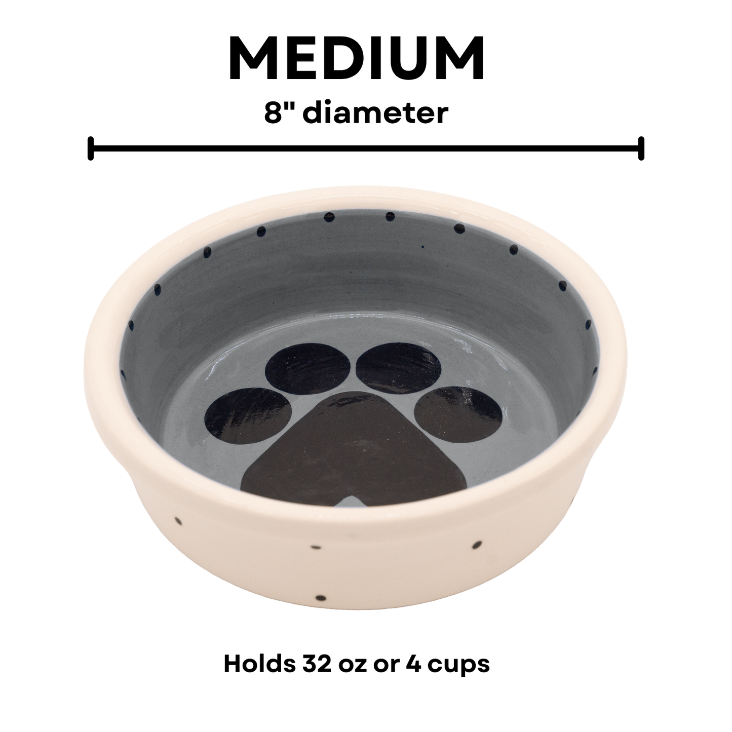 Medium charcoal gray handmade ceramic dog bowl with large black paw print inside and small black dot details around the outside and inner rim, 8-inch diameter and 4-cup (32-ounce) capacity.