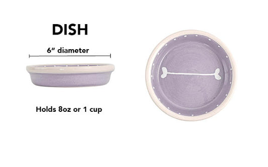 Lavender handmade ceramic dog dish with white bone design and dotted rim detail, 6-inch diameter and 1-cup (8-ounce) capacity.