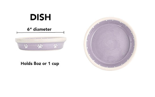 Lavender handmade ceramic pet dish with mini white paw prints and dotted rim detail, 6-inch diameter and 1-cup (8-ounce) capacity.