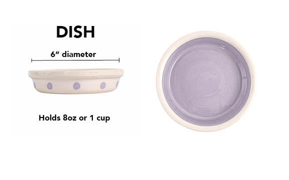 White handmade ceramic pet dish with large lavender hand-painted dots and a solid lavender interior, 6-inch diameter and 1-cup (8-ounce) capacity.