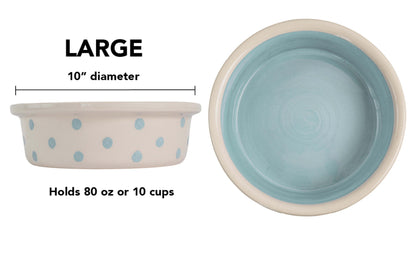 Large sky blue handmade ceramic dog and cat bowl with large hand-painted dots, solid sky blue interior, 10-inch diameter, and 10-cup (80-ounce) capacity.