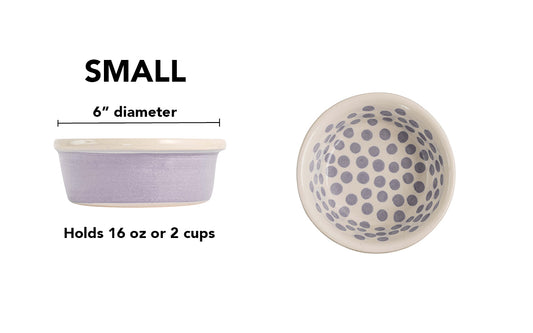 Small lavender handmade ceramic dog bowl with lavender polka dots inside, rich lavender color-washed exterior and white rim, 6-inch diameter and 2-cup (16-ounce) capacity.