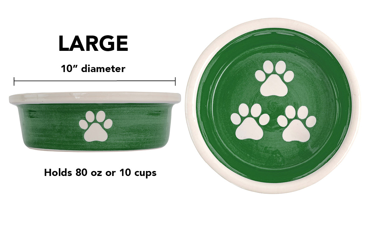 Large green handmade ceramic dog bowl with white paw prints, 10-inch diameter and 10-cup (80-ounce) capacity.