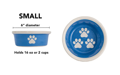 Small blue handmade ceramic dog bowl with white paw prints, 6-inch diameter and 2-cup (16-ounce) capacity.