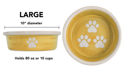 Large yellow handmade ceramic dog bowl with white paw prints, 10-inch diameter and 10-cup (80-ounce) capacity.