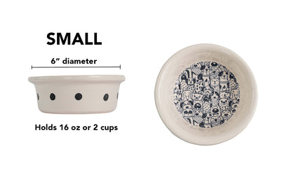Small white handmade ceramic dog bowl with black polka dots around the outside and detailed black dog crowd illustration inside, 6-inch diameter and 2-cup (16-ounce) capacity.